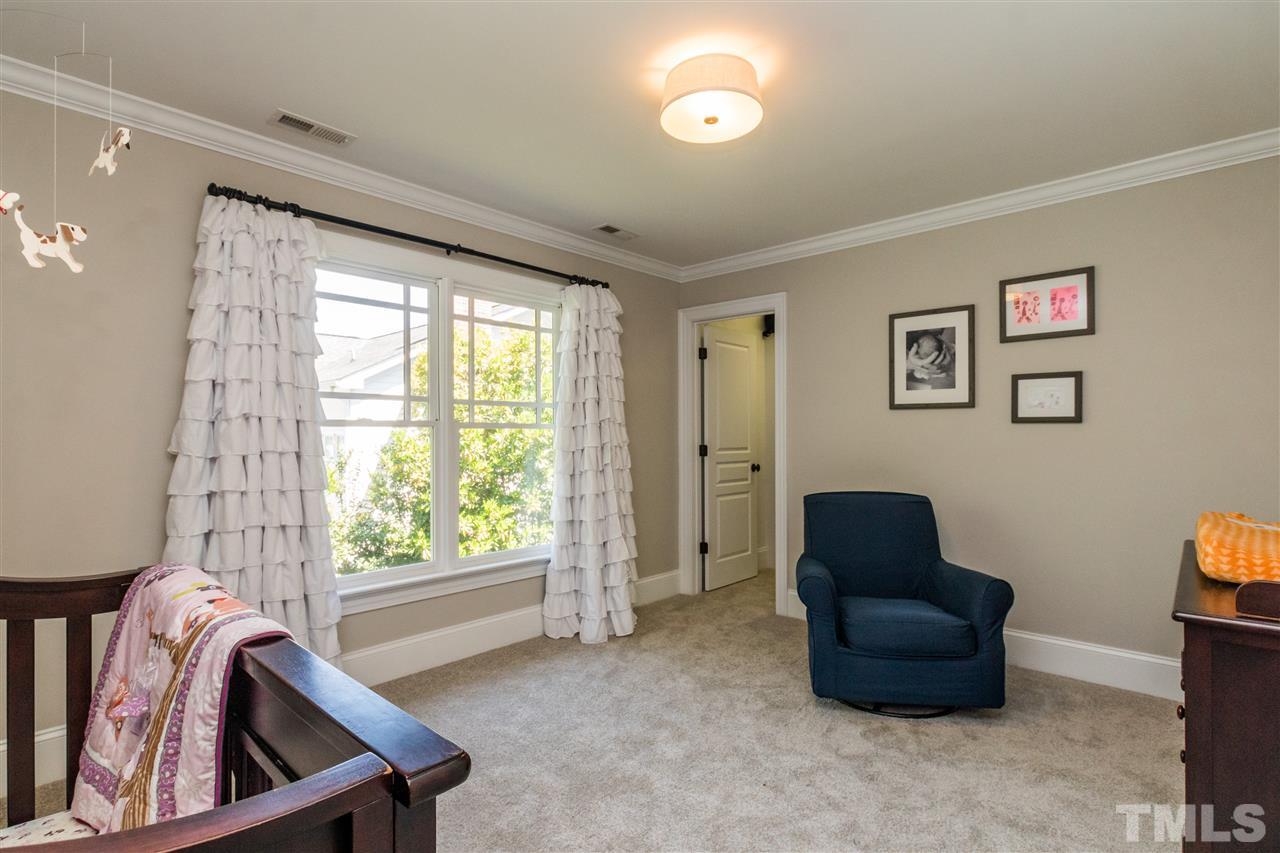 1407 Nottingham Road Raleigh, NC 27607 - Photo 20 of 30 a living room with furniture and a window