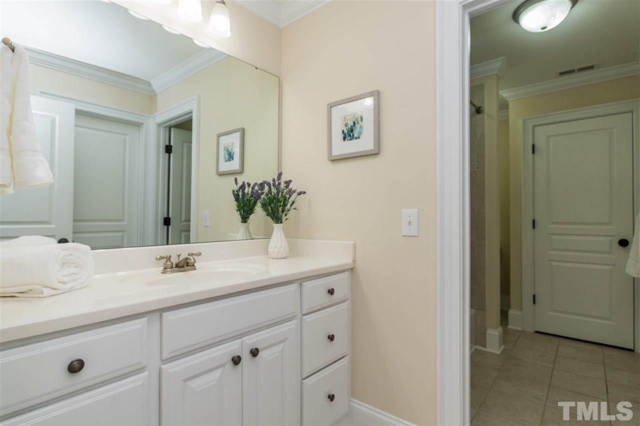 1407 Nottingham Road Raleigh, NC 27607 - Photo 23 of 30 a bathroom with a sink and a mirror