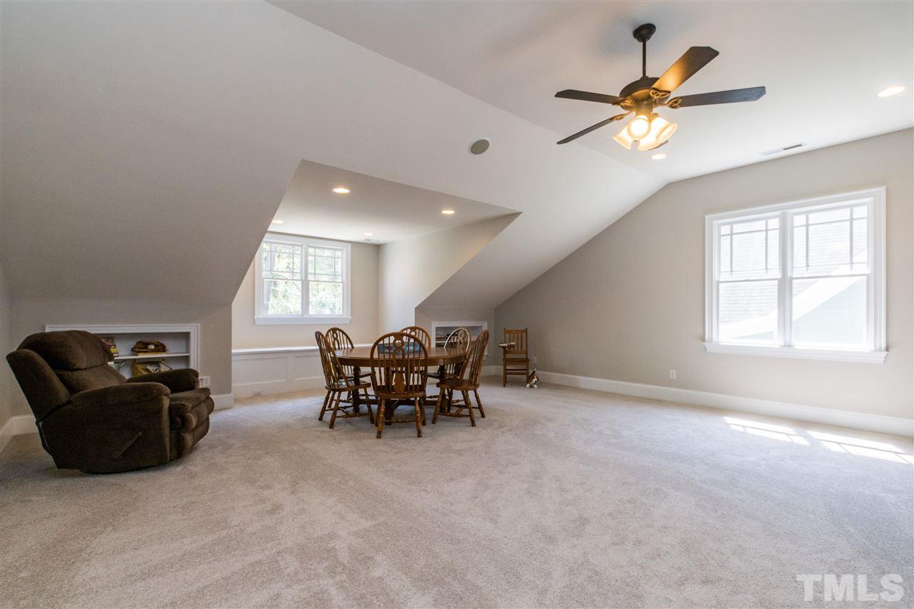 1407 Nottingham Road Raleigh, NC 27607 - Photo 24 of 30 a view of a livingroom with furniture and a window