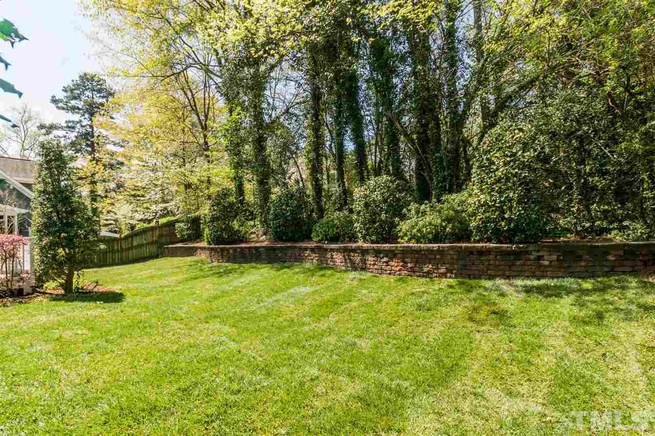 1407 Nottingham Road Raleigh, NC 27607 - Photo 27 of 30 a view of swimming pool with a yard