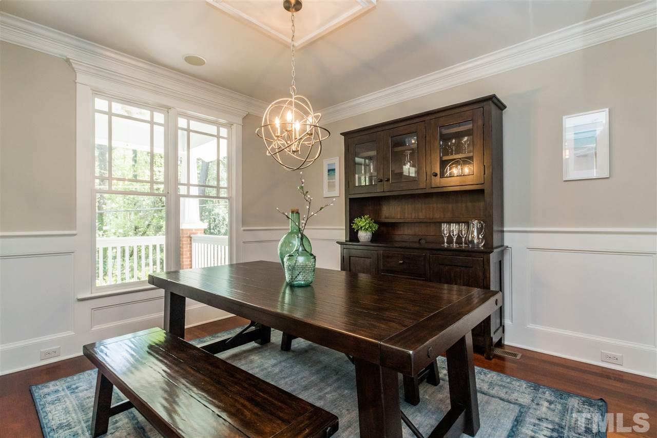 1407 Nottingham Road Raleigh, NC 27607 - Photo 6 of 30 a view of a dining room with furniture window and wooden floor