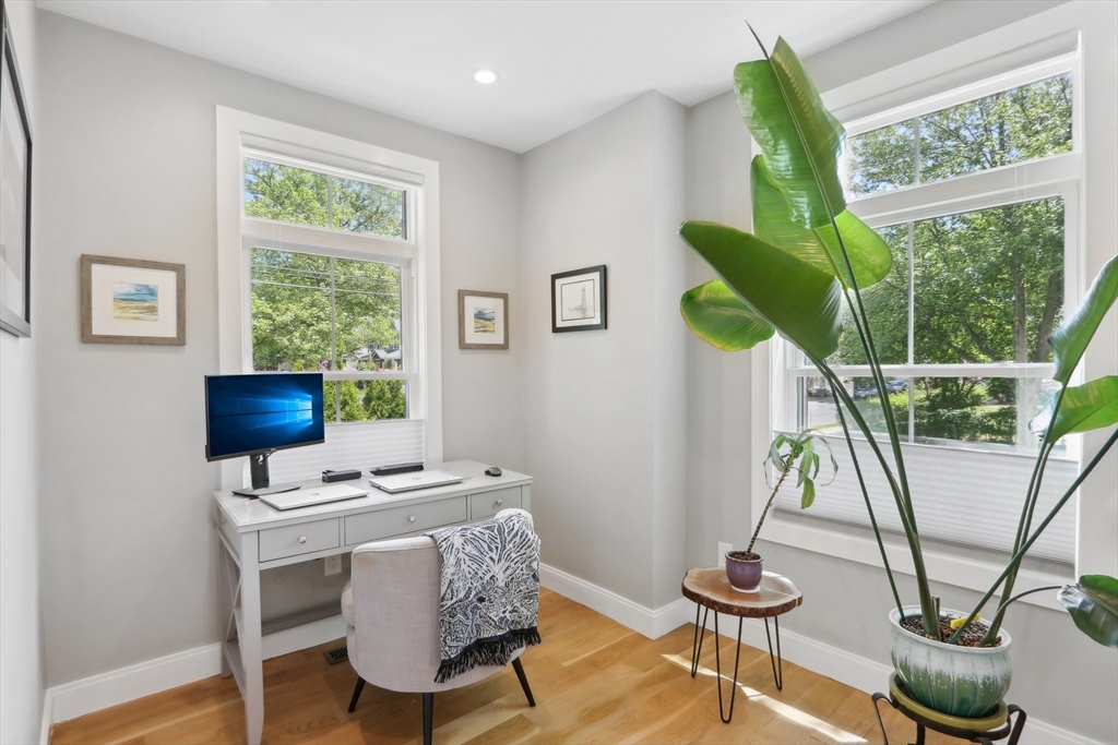 49 A Chestnut Street, Unit 1 Wakefield, MA 01880 - Photo 9 of 22 a workspace with furniture and a window