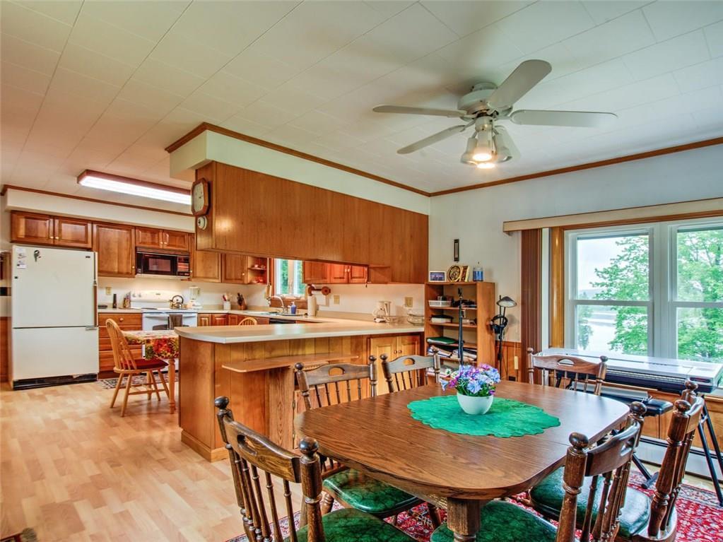 309 Lake Road Wilton, ME 04294 - Photo 9 of 35 Dining room with open sight lines to...