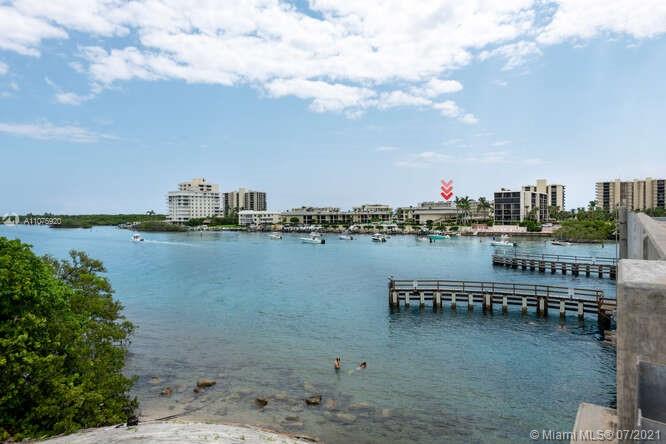 275 South Beach Road, Unit A103 Tequesta, FL 33469 - Photo 1 of 35 a view of a city and lake