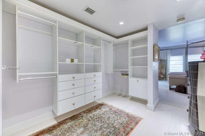 275 South Beach Road, Unit A103 Tequesta, FL 33469 - Photo 18 of 35 a view of walk in closet