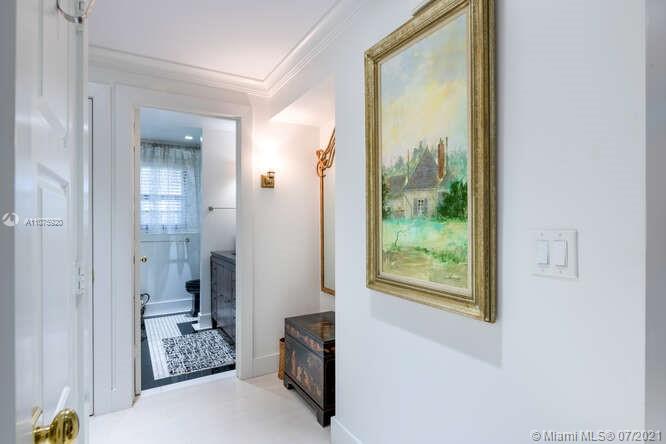 275 South Beach Road, Unit A103 Tequesta, FL 33469 - Photo 25 of 35 a view of a livingroom with furniture and front door