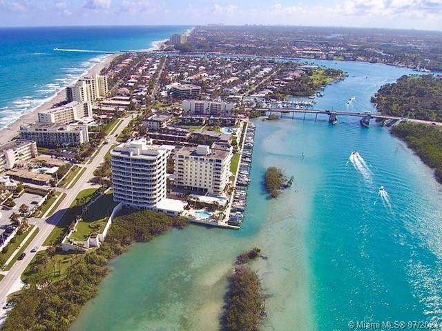 275 South Beach Road, Unit A103 Tequesta, FL 33469 - Photo 35 of 35 an aerial view of residential houses with outdoor space and lake view