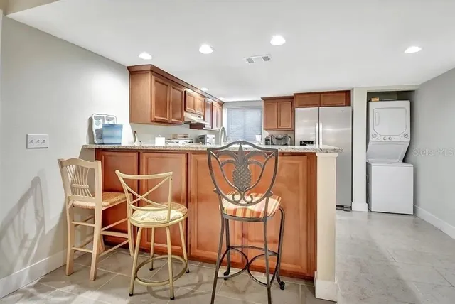 a view of a dining room kitchen and a dining table chairs