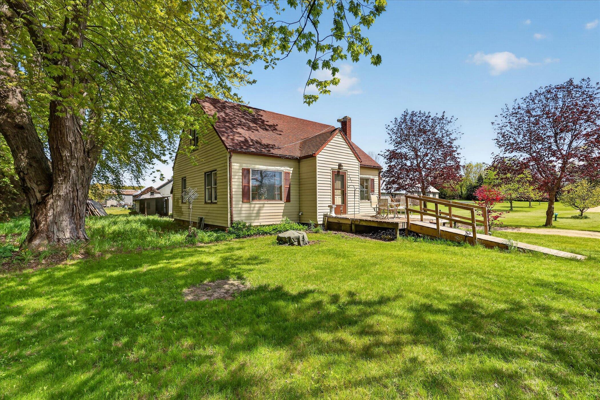 261 19 Mile Road Northeast Cedar Springs, MI 49319 - Photo 2 of 89 02-261-19-Mile-Rd-NE-Cedar-Springs-Windo