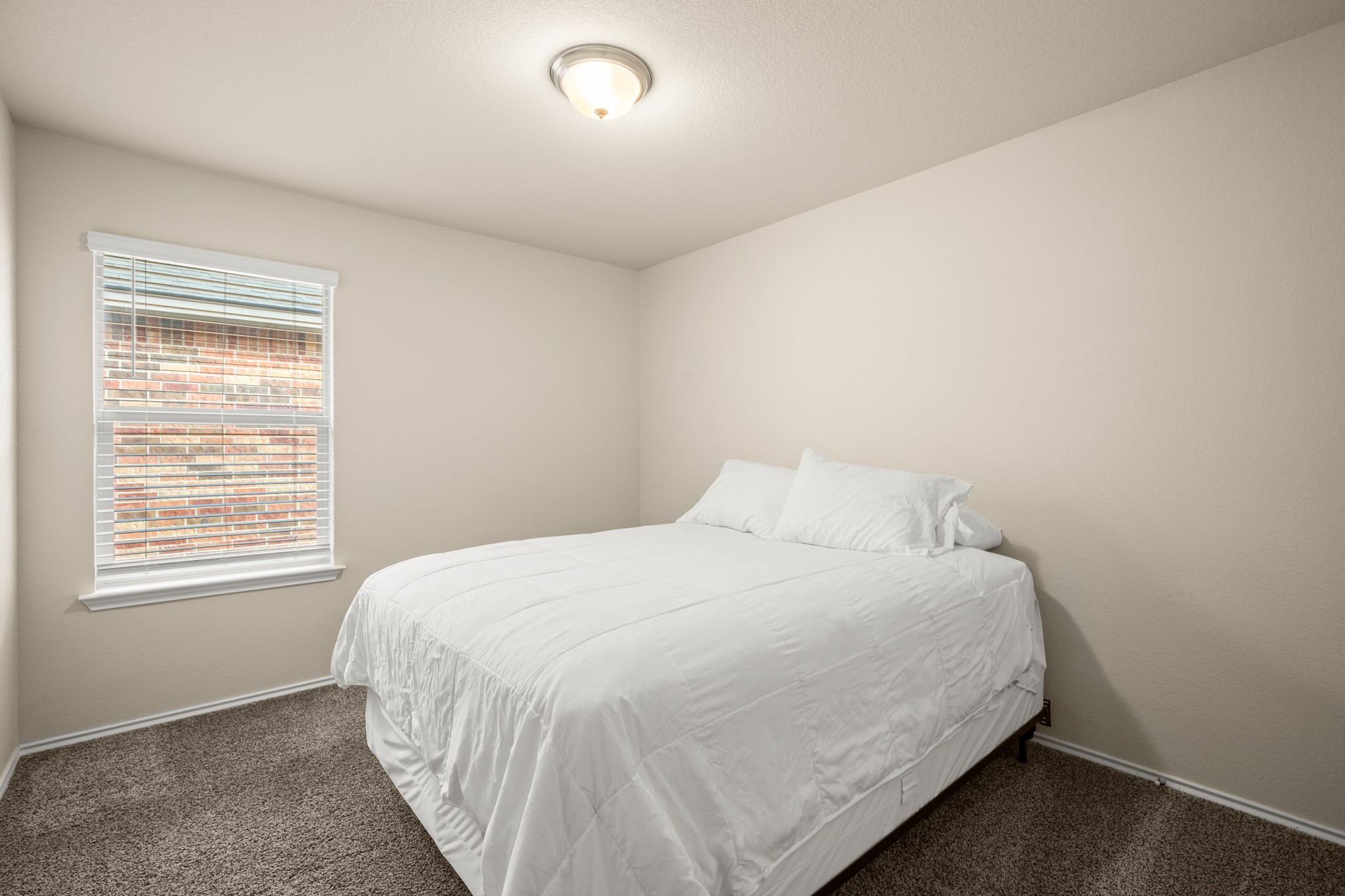 5526 Perdita Drive Belton, TX 76513 - Photo 21 of 26 Bedroom with dark colored carpet