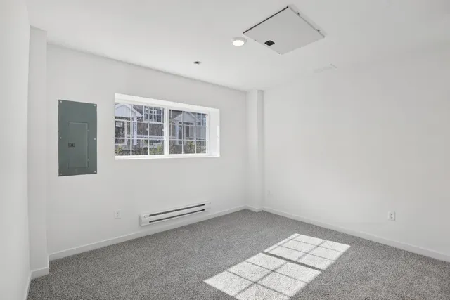 an empty room with windows