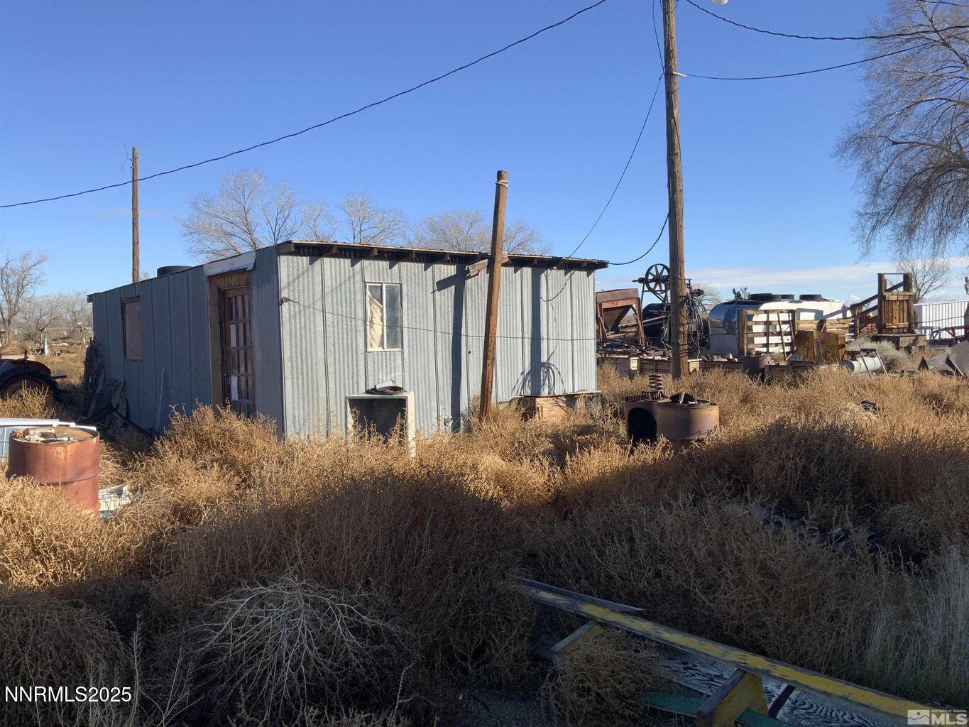 6840 Reno Highway Fallon, NV 89406 - Photo 5 of 6 a view of a house with a yard