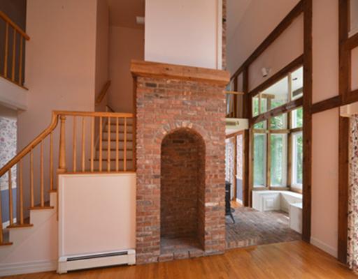50 Winter Harbor Road Kennebunkport, ME 04046 - Photo 18 of 25 Living Room. Brick archway wood storage