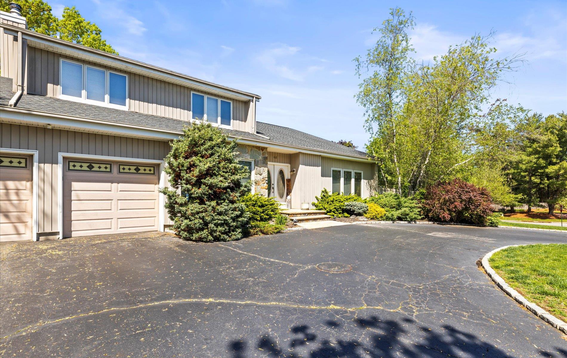 65 Annandale Road Commack, NY 11725 - Photo 1 of 1 a front view of a house with garden