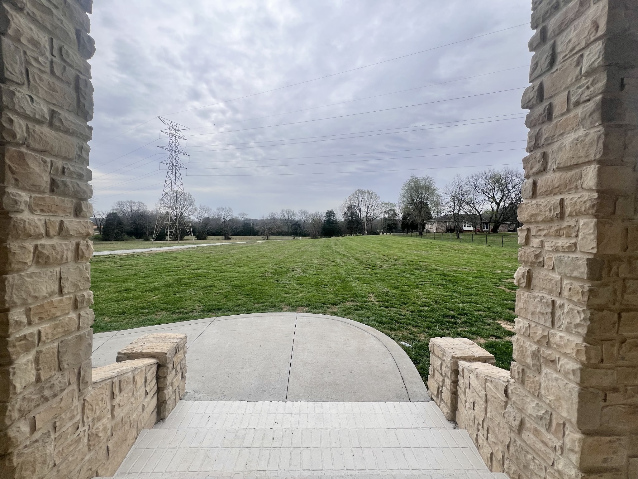 1465 Smith Road Lebanon, TN 37087 - Photo 5 of 66 a view of a garden and basketball court