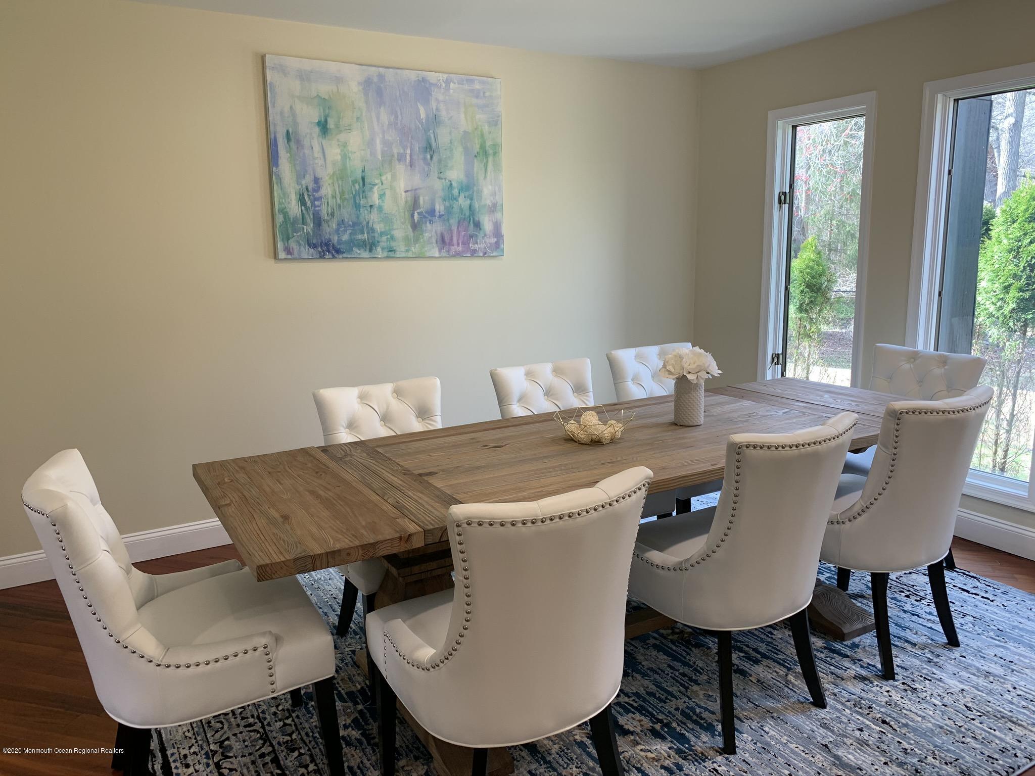 33 Heath Avenue Oakhurst, NJ 07755 - Photo 19 of 48 a view of a dining room with furniture and window