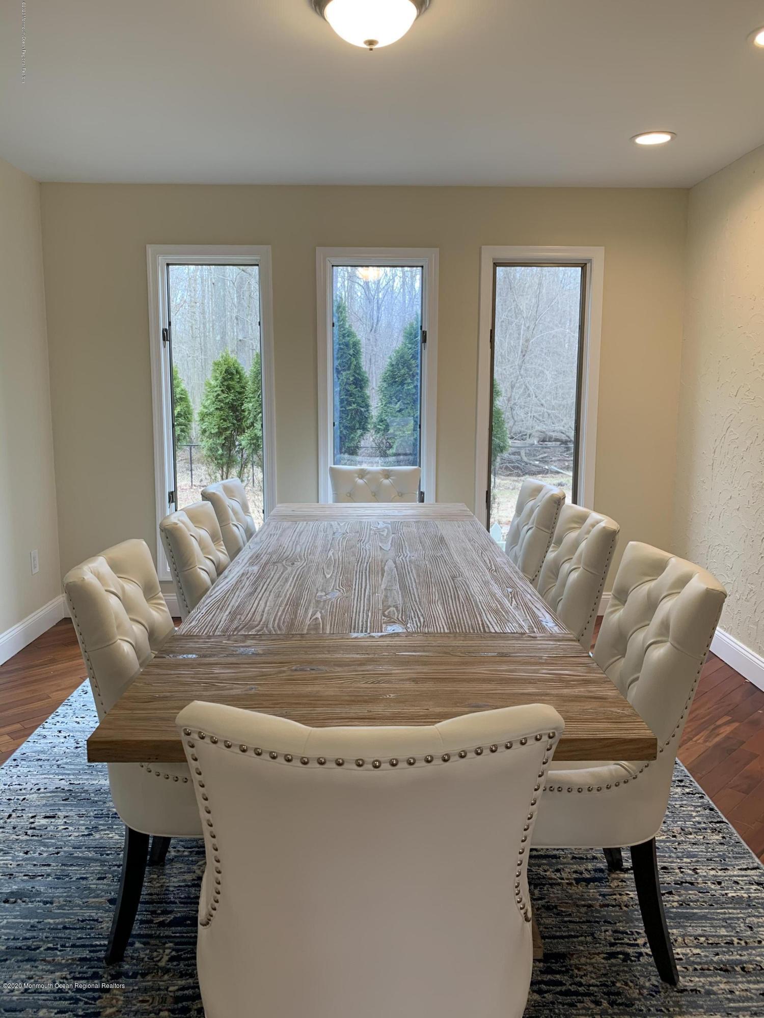 33 Heath Avenue Oakhurst, NJ 07755 - Photo 20 of 48 a view of a dining room with furniture window and outside view
