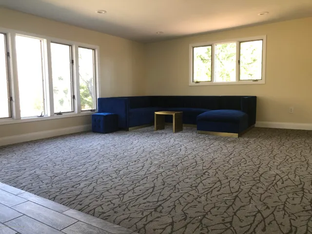 a view of a livingroom from a hallway