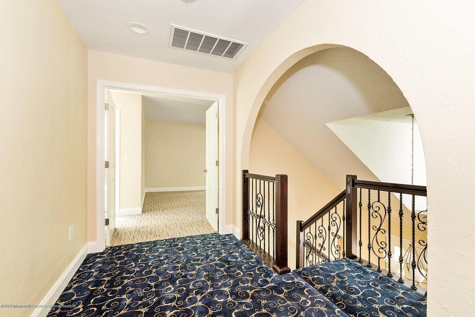 33 Heath Avenue Oakhurst, NJ 07755 - Photo 23 of 48 a view of a livingroom from a hallway