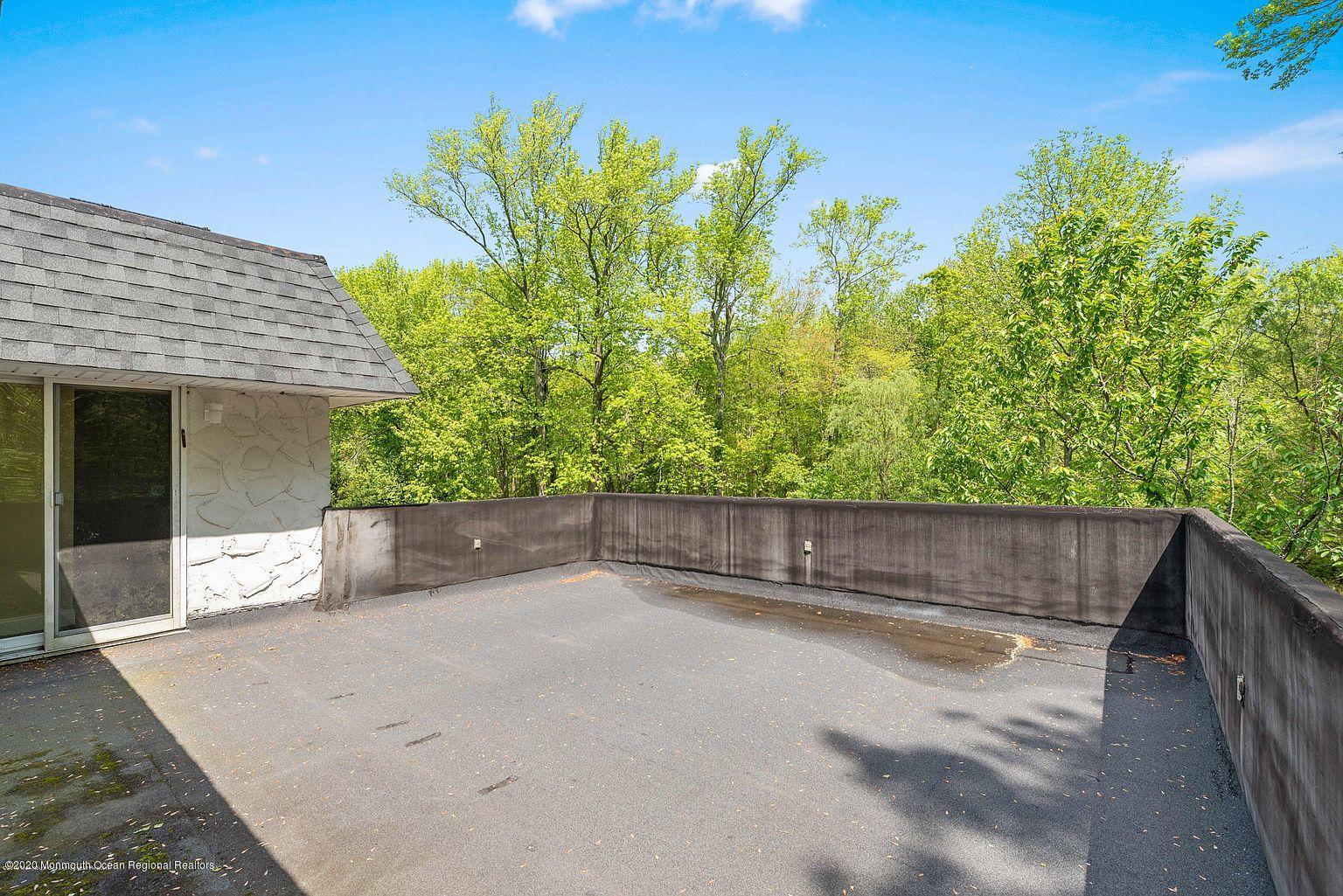 33 Heath Avenue Oakhurst, NJ 07755 - Photo 40 of 48 a view of swimming pool with outdoor seating