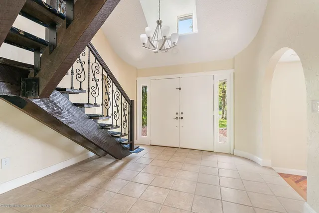 a view of an entryway with staircase
