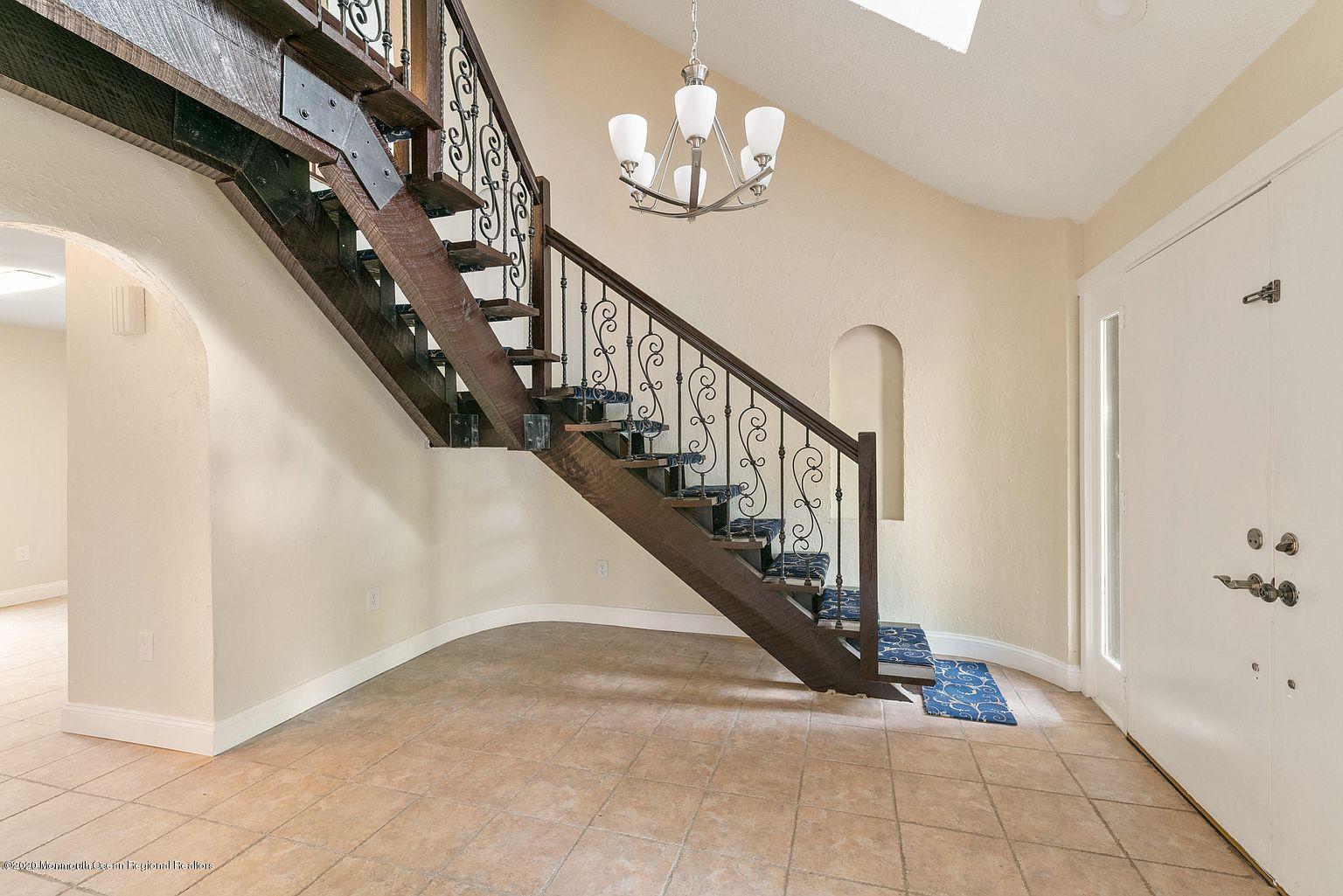 33 Heath Avenue Oakhurst, NJ 07755 - Photo 9 of 48 a view of entryway and hall with a front door