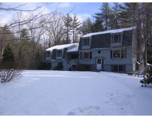 292 Mulpus Road Lunenburg, MA 01462 - Photo 1 of 18 a front view of a house with a yard