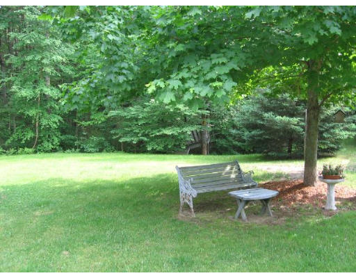292 Mulpus Road Lunenburg, MA 01462 - Photo 17 of 18 a view of a bench in a garden