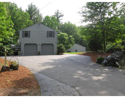 292 Mulpus Road Lunenburg, MA 01462 - Photo 18 of 18 a view of a house with backyard and a tree