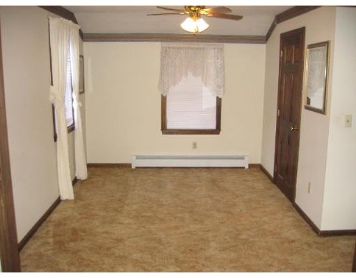 292 Mulpus Road Lunenburg, MA 01462 - Photo 6 of 18 a view of an empty room with wooden door