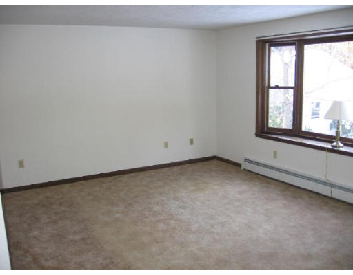 292 Mulpus Road Lunenburg, MA 01462 - Photo 9 of 18 an empty room with a window