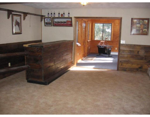 292 Mulpus Road Lunenburg, MA 01462 - Photo 10 of 18 a living room with furniture and a window