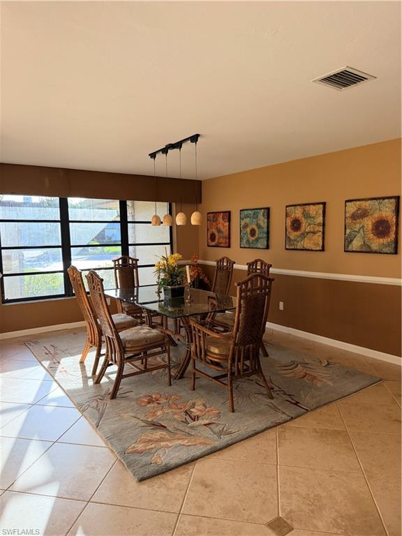 1941 Princess Court Naples, FL 34110 - Photo 16 of 17 a view of a dining room with furniture