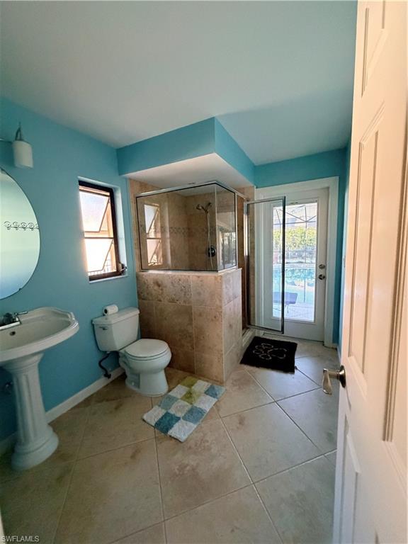 1941 Princess Court Naples, FL 34110 - Photo 3 of 17 a living room with furniture and a large window