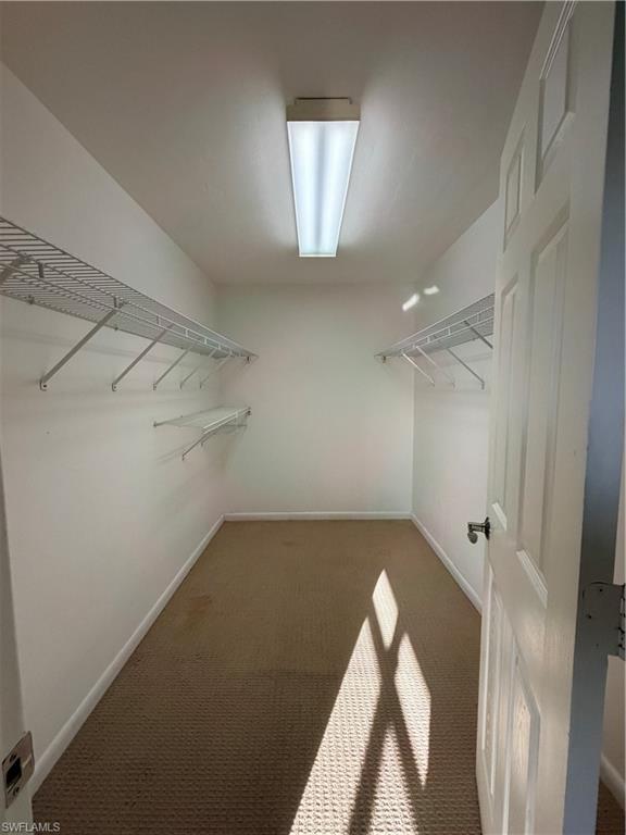 1941 Princess Court Naples, FL 34110 - Photo 6 of 17 wooden floor in an empty room