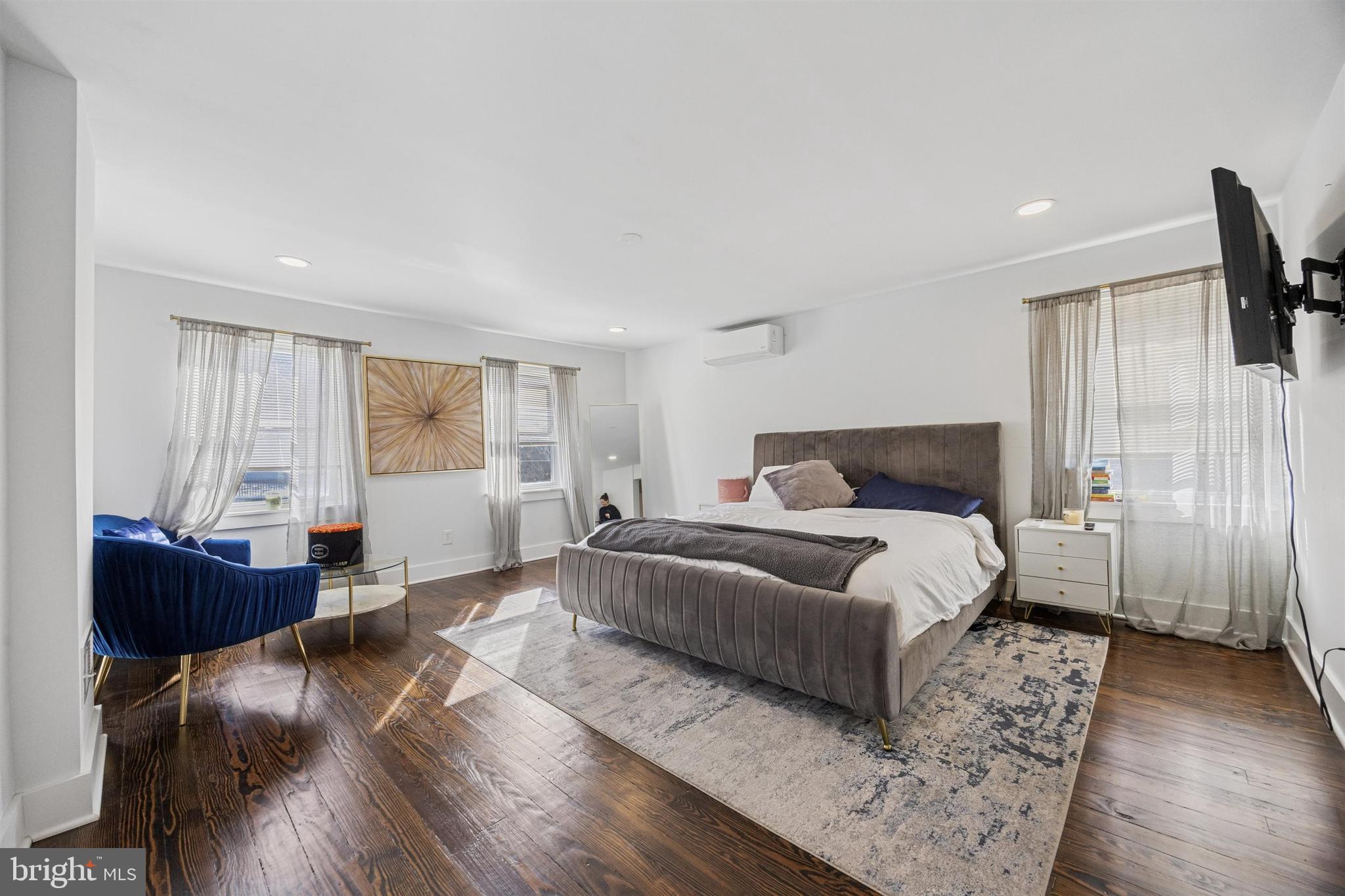 14 Maple Street Conshohocken, PA 19428 - Photo 18 of 27 a bedroom with a bed and wooden floor