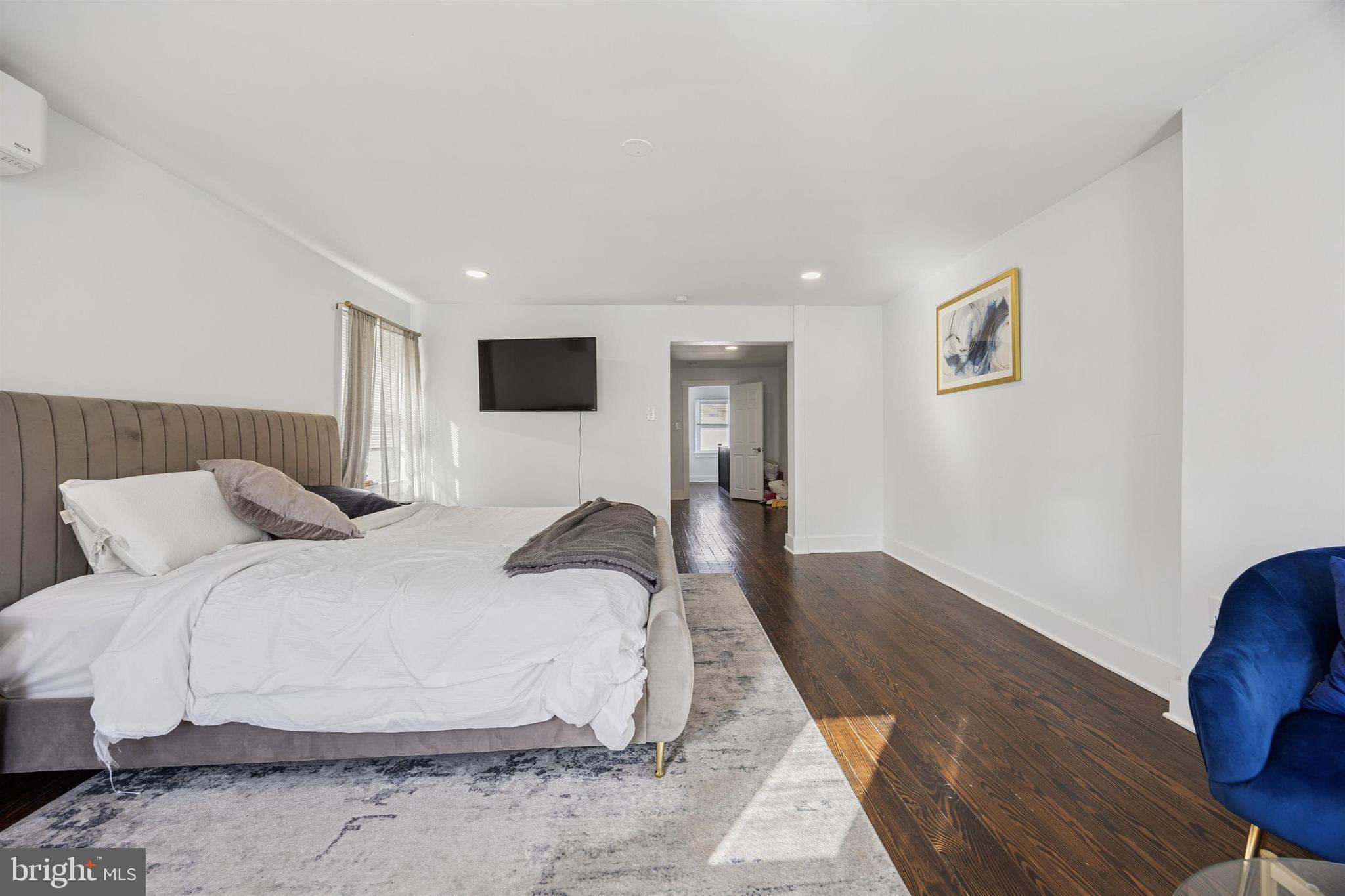 14 Maple Street Conshohocken, PA 19428 - Photo 19 of 27 a large white bed in a white room