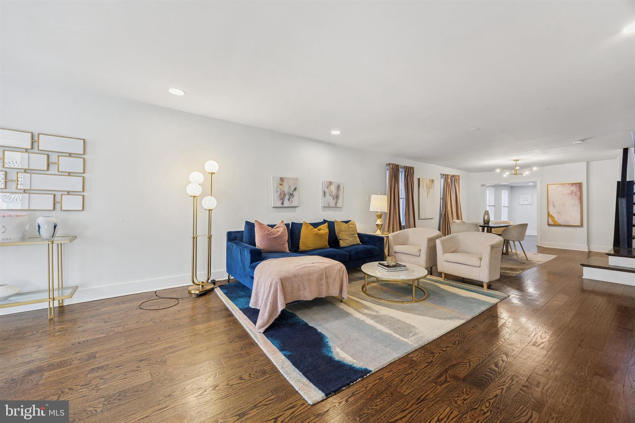 14 Maple Street Conshohocken, PA 19428 - Photo 2 of 27 a bed room with furniture and wooden floor