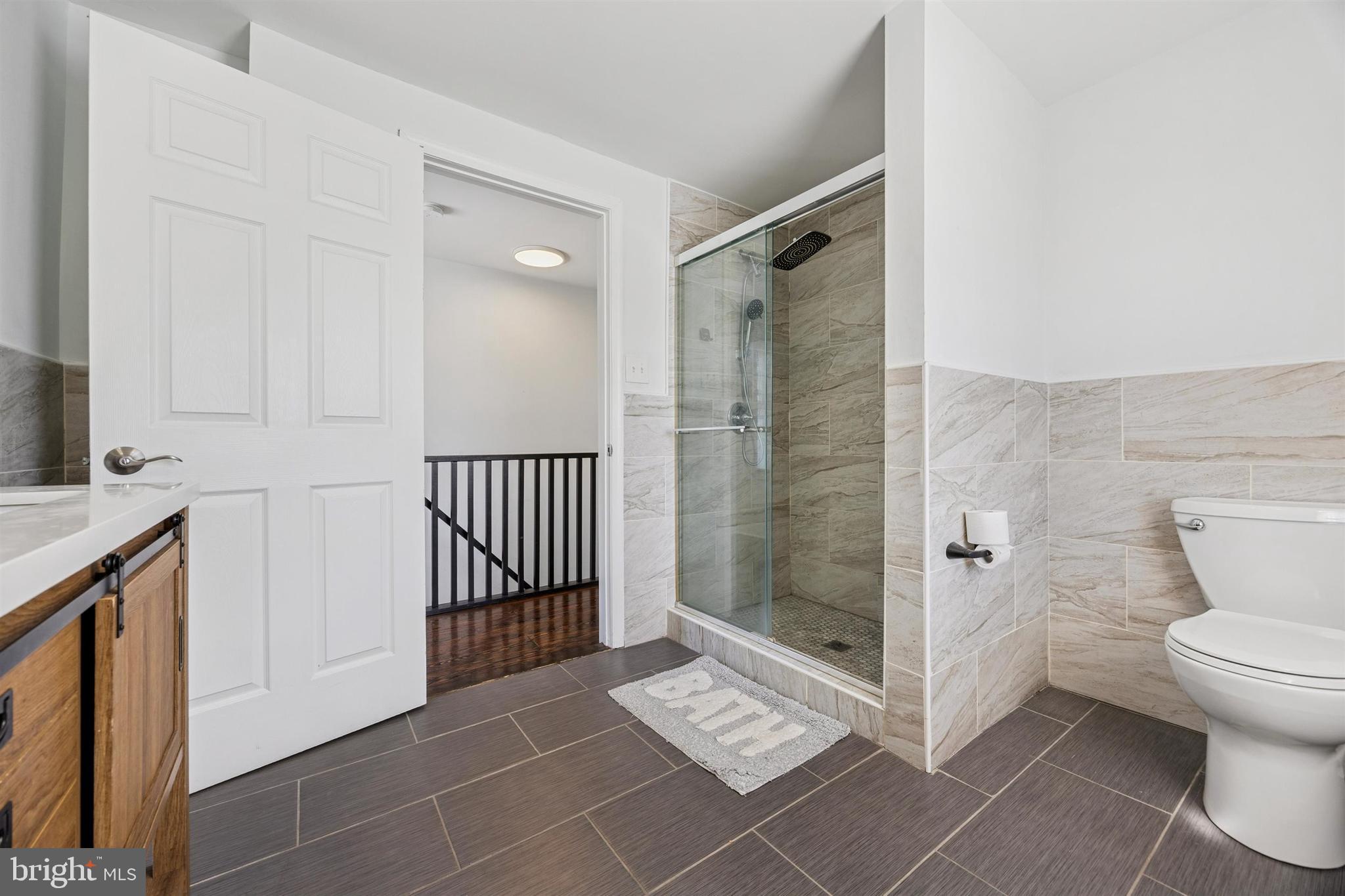 14 Maple Street Conshohocken, PA 19428 - Photo 24 of 27 a bathroom with a shower and a toilet