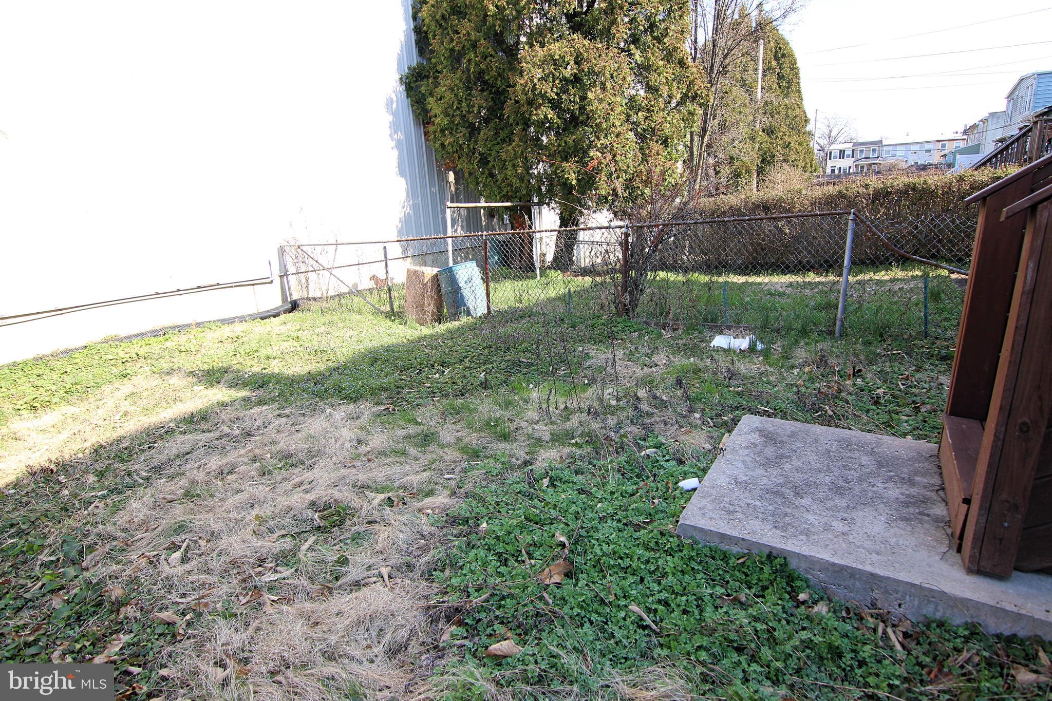 14 Maple Street Conshohocken, PA 19428 - Photo 28 of 28 a view of a backyard with a garden