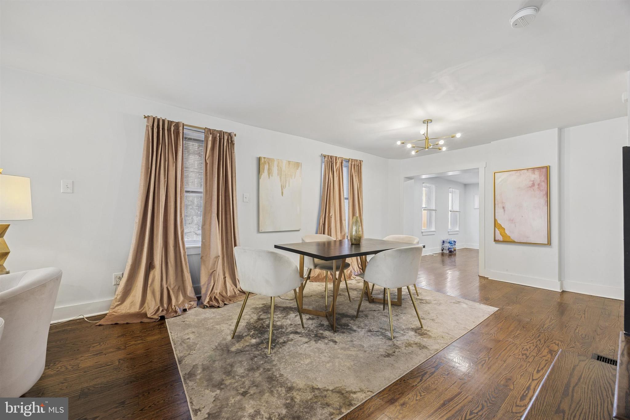 14 Maple Street Conshohocken, PA 19428 - Photo 5 of 27 a view of a livingroom with furniture and a window