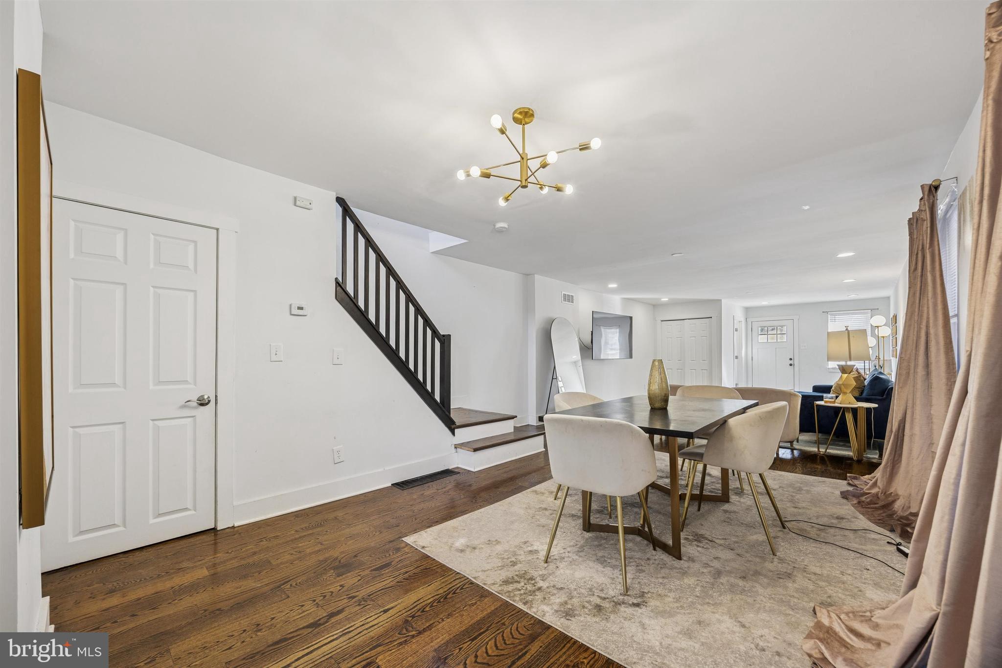 14 Maple Street Conshohocken, PA 19428 - Photo 6 of 27 a view of a dining room with furniture and wooden floor