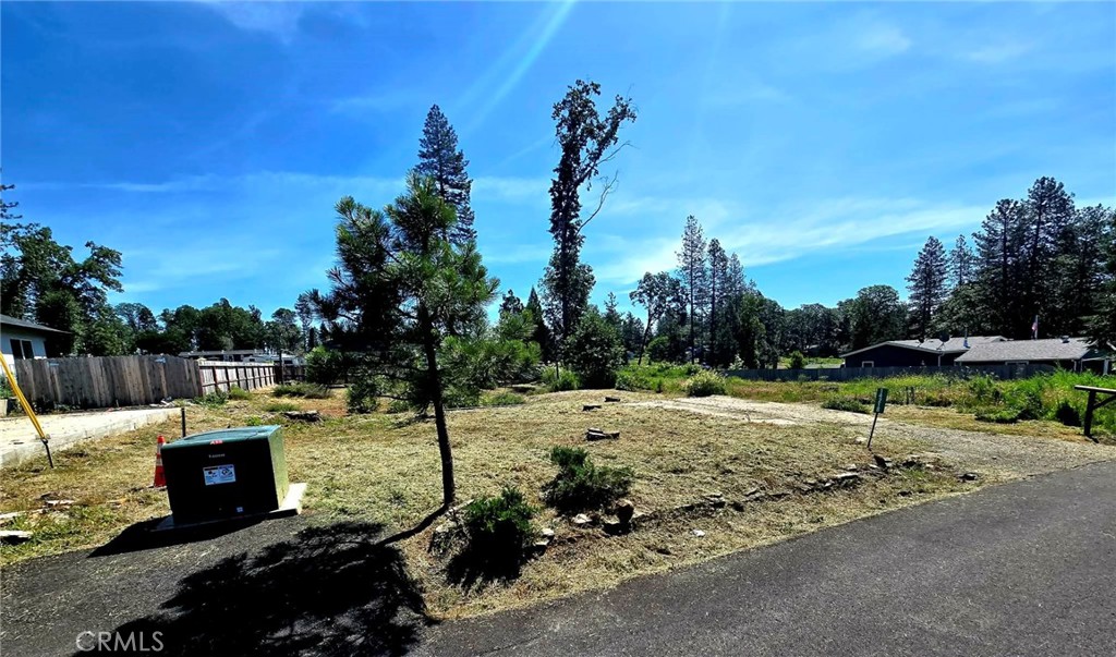 14218 Decatur Drive Magalia, CA 95954 - Photo 2 of 5 a view of a lake with a house