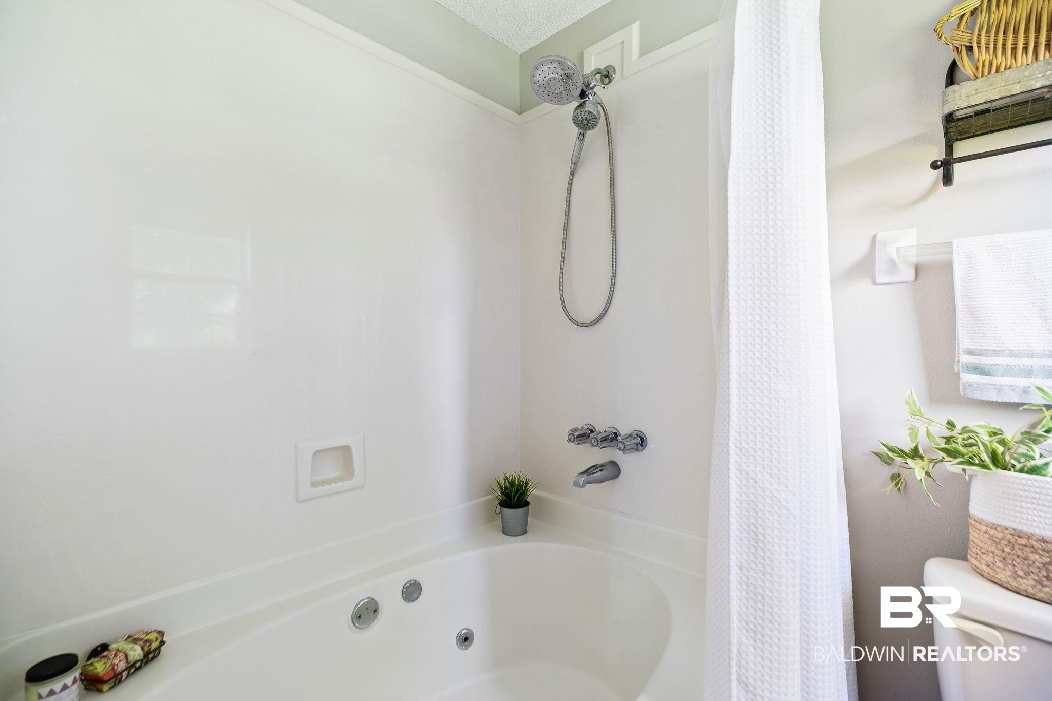 53 Magnolia Circle Foley, AL 36535 - Photo 30 of 33 Bathroom with a textured ceiling, toilet, and shower / bath combination with curtain