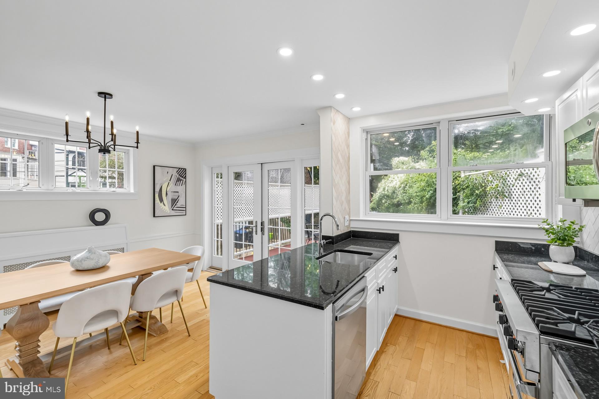 1628 44th Street Northwest Washington, DC 20007 - Photo 11 of 40 a kitchen that has a sink and a stove
