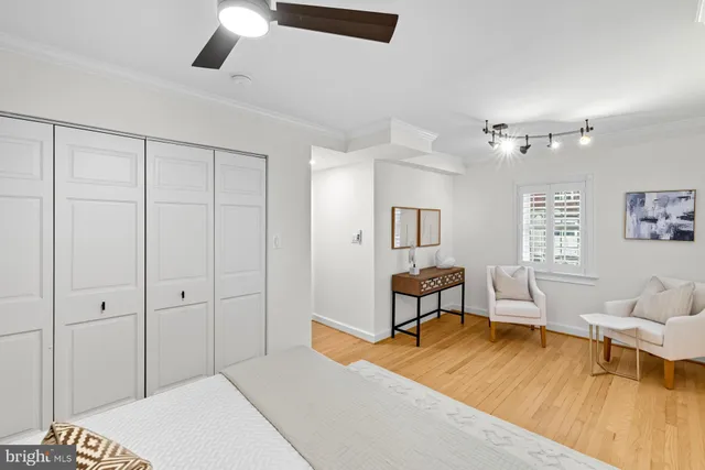 a bedroom with a bed and furniture