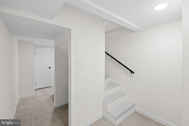 a view of entryway with stairs