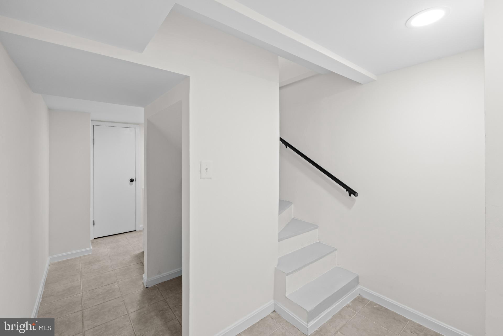 1628 44th Street Northwest Washington, DC 20007 - Photo 27 of 40 a view of entryway with stairs