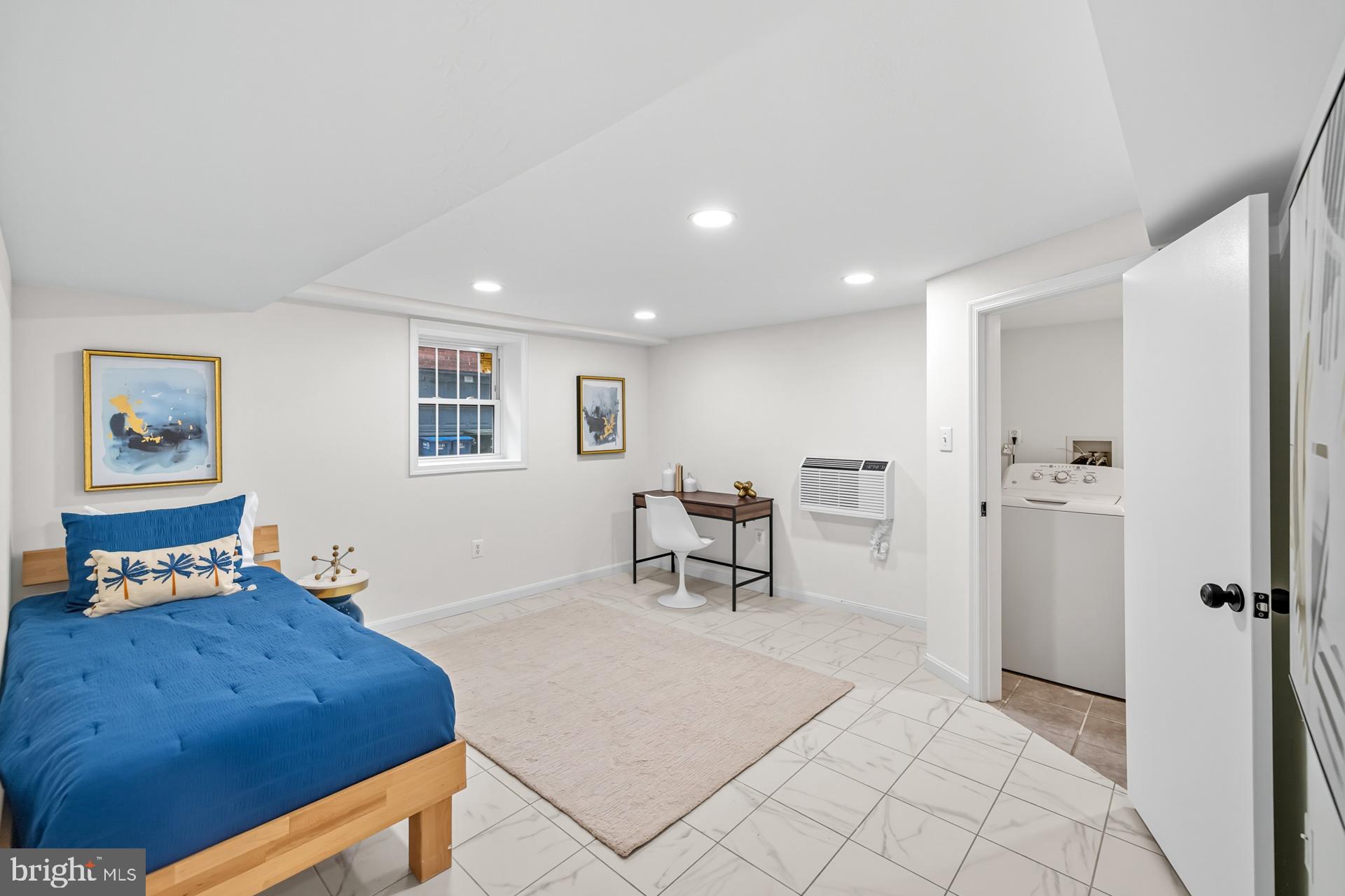 1628 44th Street Northwest Washington, DC 20007 - Photo 31 of 40 a living room with furniture and a table