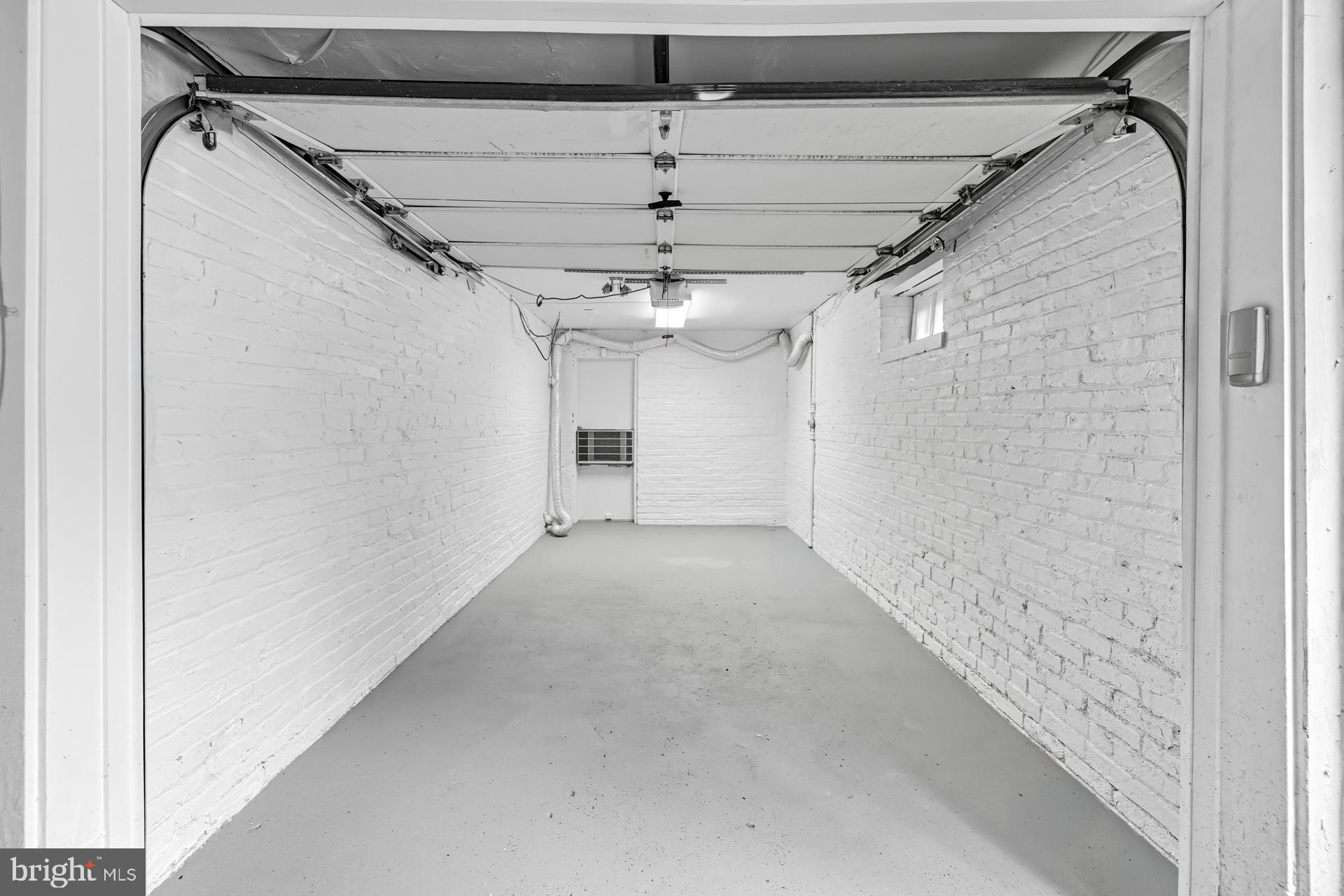 1628 44th Street Northwest Washington, DC 20007 - Photo 34 of 40 a view of a hallway with a ceiling fan and window